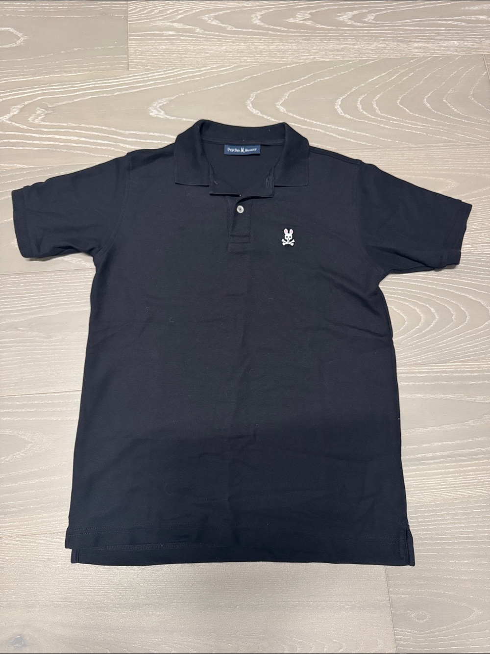 Psycho Bunny Black Polo with White Bunny Skull Emblem
